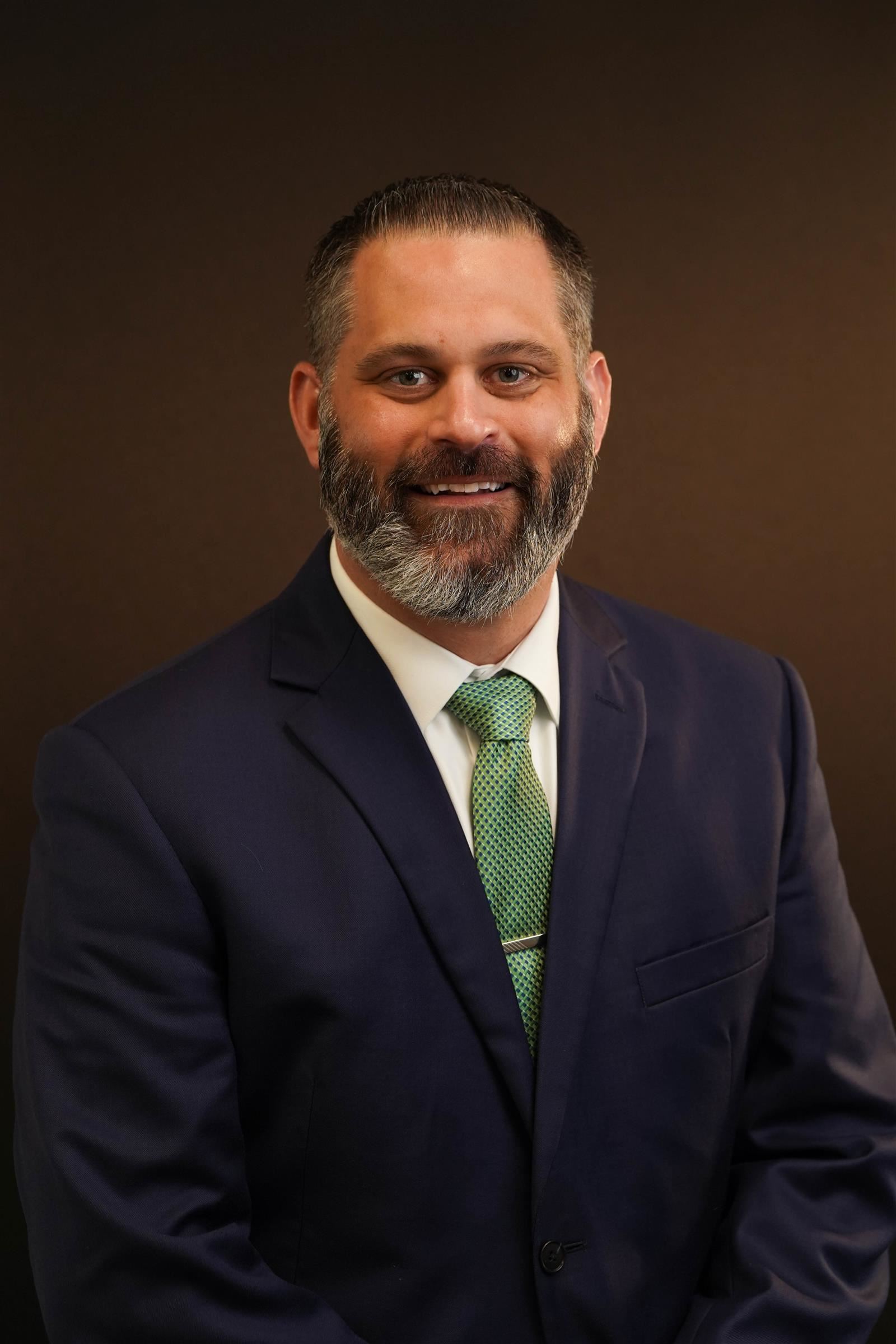 Justin Kowrach, Principal